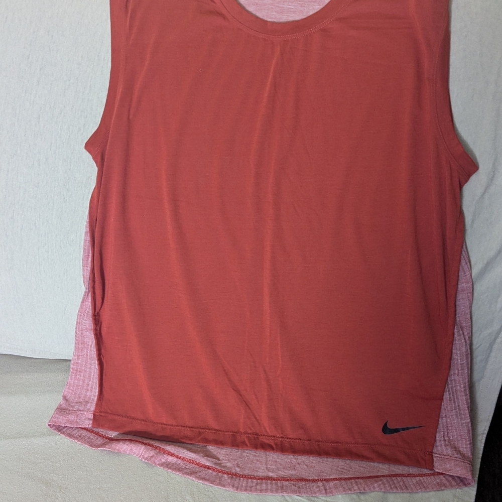 Nike dri-fit sleeveless shirt NWOT orange color